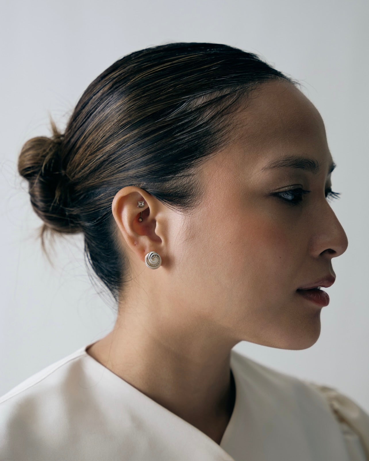 Swirl Studs in White Enamel