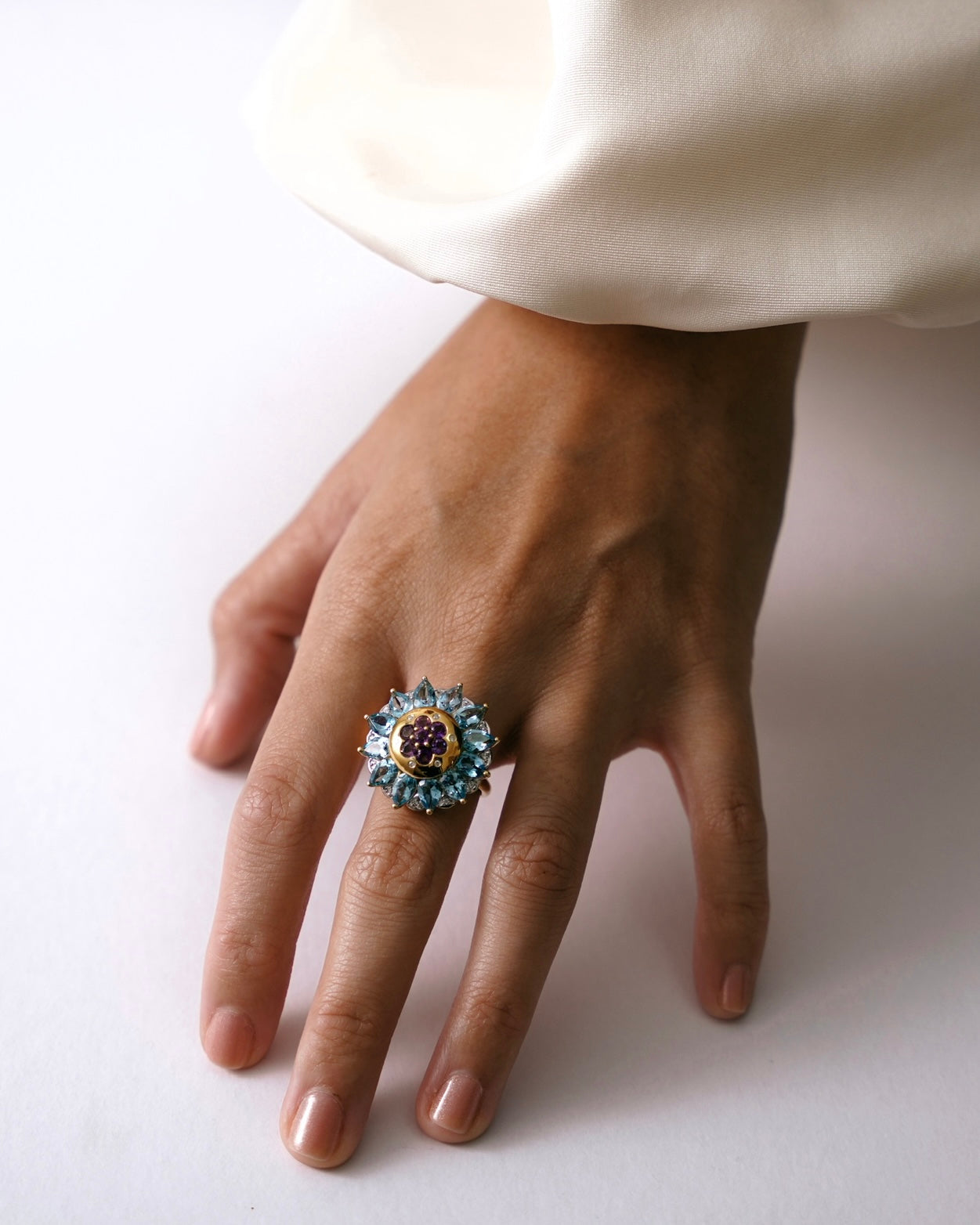 Spencer in blue topaz + amethyst ring