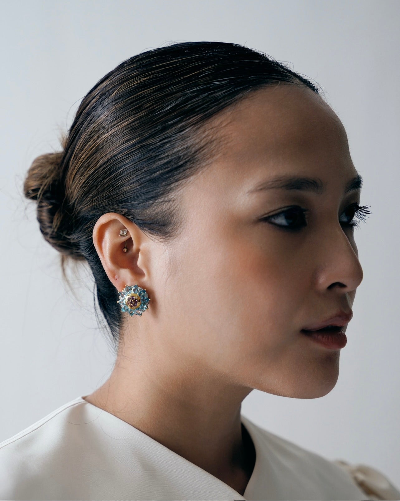 Spencer in blue topaz + amethyst earrings