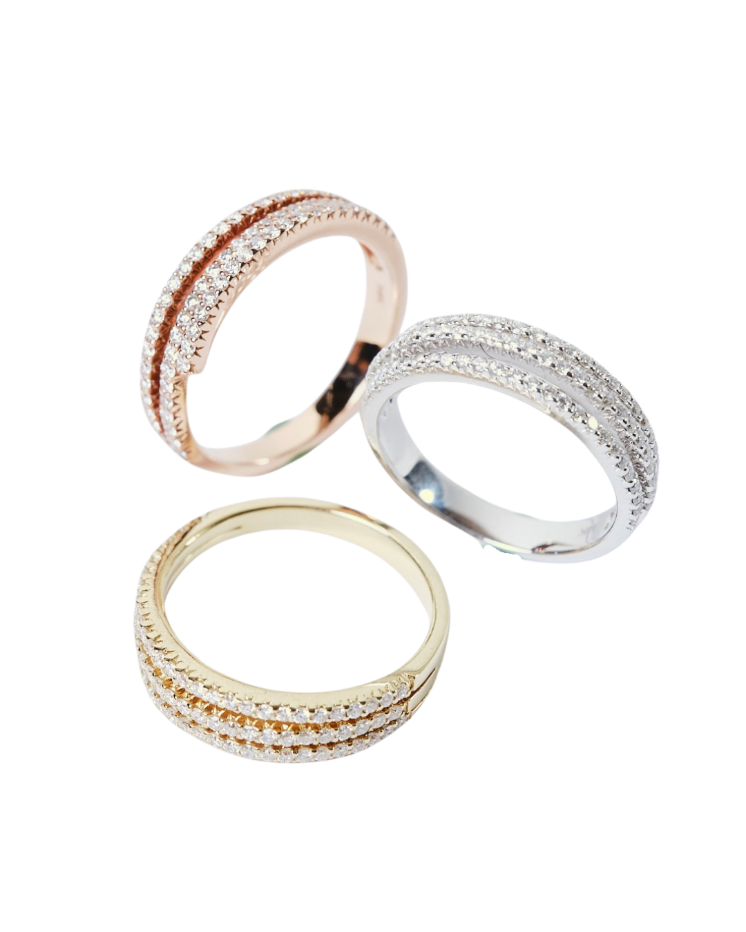 Triple row diamond band in yellow, rose, & white gold
